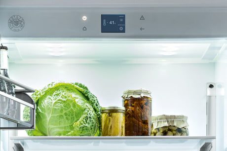 Bertazzoni 36" Built-in Refrigerator Column Stainless Steel Professional Series showcasing fresh produce and jars.