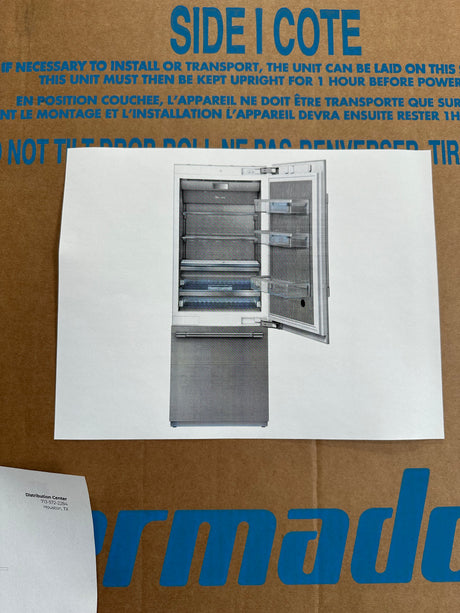 Built-in refrigerator design showcasing spacious interior, ideal for appliance liquidation and discounted luxury appliances.